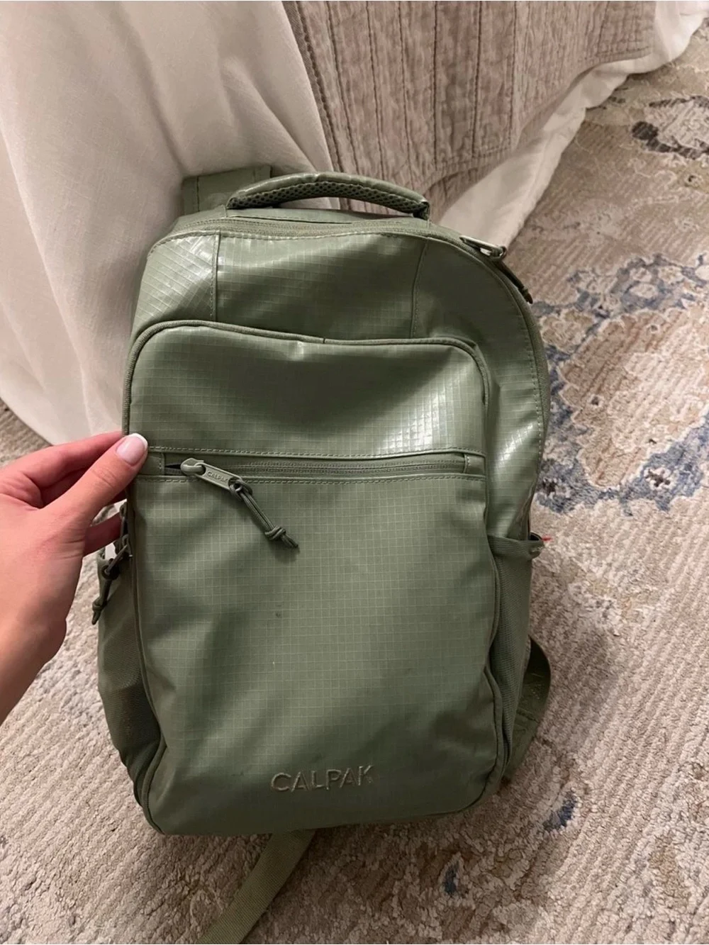 Calpak Olive Green Compact Travel Backpack for Men